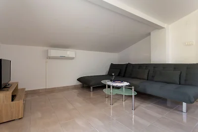 Appartamento in casa con terrazza coperta