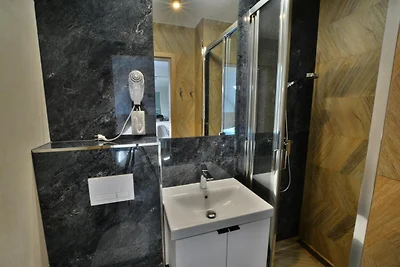 Appartement in Ustronie Morskie aan Zee