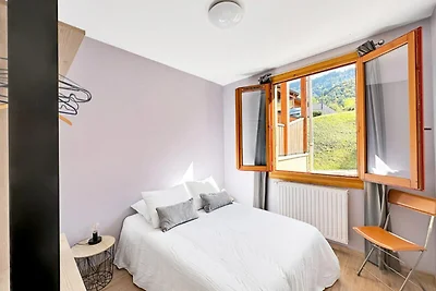 Appartement in Les Carroz met privétuin