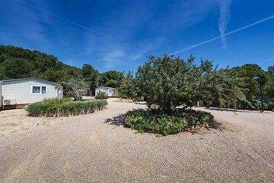 Schöner Holzbungalow mit Gemeinschaftspool