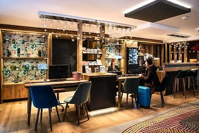 Wohnung in den Alpen mit Kamin