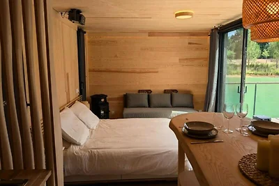 Ferienhaus an einem privaten Teich mit Blick ...