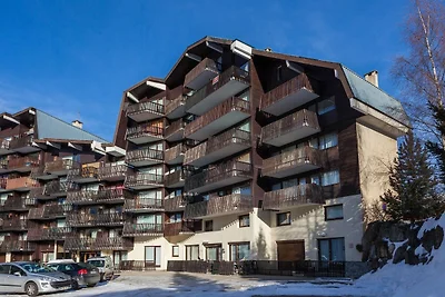 Slope-side apartment with balcony views