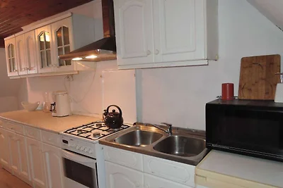 Ferienhaus mit umzהuntem Garten in Stepnica