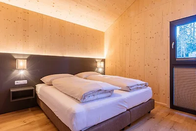 Chalet con vasca idromassaggio sul balcone