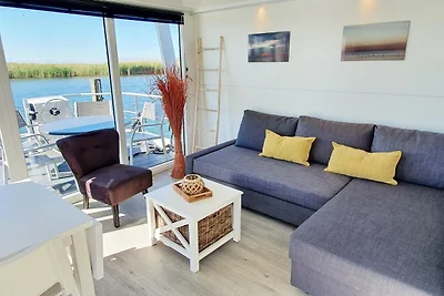 Drijvende lodge met terras in Lelystad