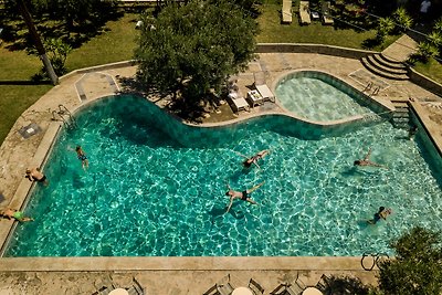 Monolocale con piscina comunale a Gerakini