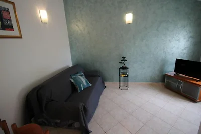 Appartement aan zee met terras voor 4...