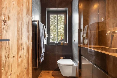 Duplex in Gstaad bij Skiliften & Jacuzzi