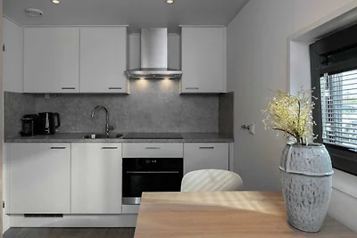Modernes Tiny House mit Spülmaschine, Strand ...