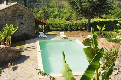 Casa in pietra con piscina in comune,...