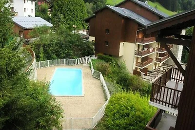 Apartment in den Alpen mit Pool und Blick auf...