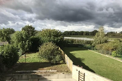 Blütenhaus mit Dachterrasse