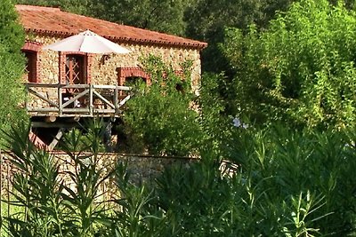 Casa in pietra sul fiume Zoya con vista sulla