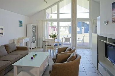 Bungalow moderno con stufa a legna e vista...