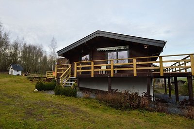 Knus chalet in Tenneville met een privébos va...