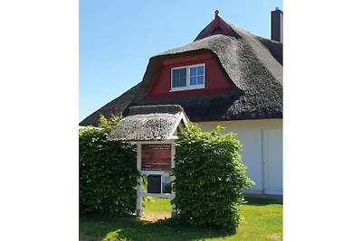 Ferienhaus mit Reetdach