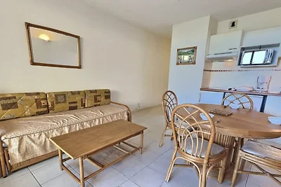 Appartement aan het strand met zwembad