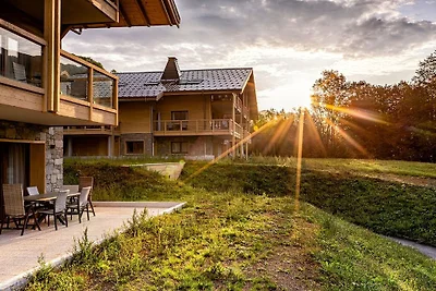 Chalet in den Alpen mit Bergblick