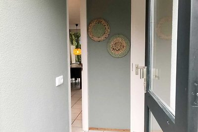 Schönes Ferienhaus mit Kamin in einem Ferienp...