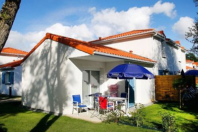 Appartement met terras bij strand