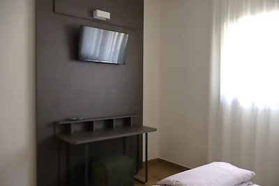 In einer klimatisierten Wohnung mit Terrasse