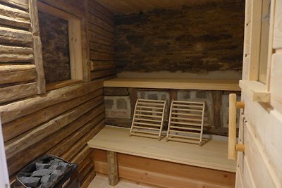 Gemütliches Ferienhaus mit Sauna in Roes,...
