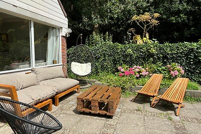 Vakantiewoning met tuin nabij bos, strand en...