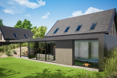 Weelderig vakantiehuis met overdekt zwembad