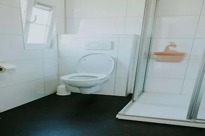 Comfortabele boshut met open ruimte.