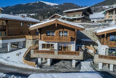 Luxe chalet met vier badkamers, bij een...