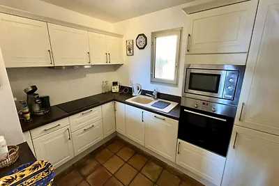 Appartement met Zeezicht en Zwembad