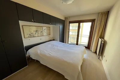 Appartement aan zee met terras