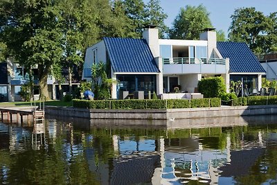 Geschakelde villa met open haard in...