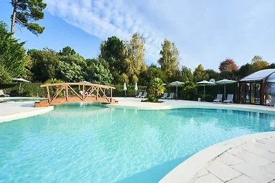 Ferienwohnung am See von Parentis mit Pool