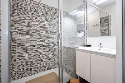 Appartement aan zee met zwembad