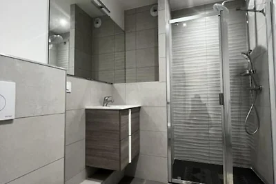 Wohnung in Grau du Roi am Strand