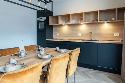 Elegante appartamento con sauna, area sciisti...