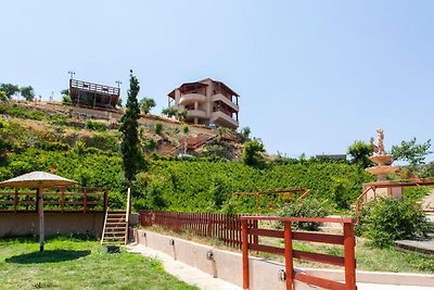 Ferienhaus in Tilisos mit Balkon