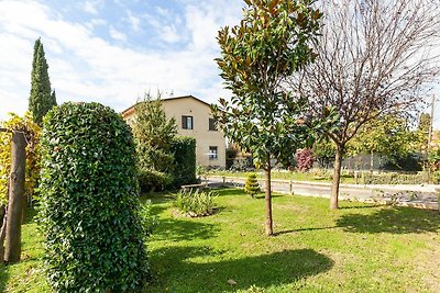 Accogliente appartamento con giardino e pisci...