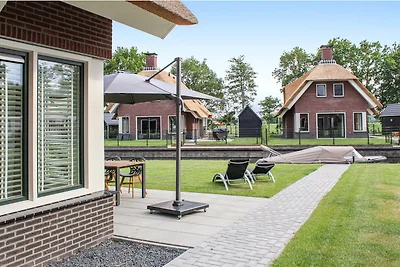 Villa mit Garten in einem Ferienpark am...