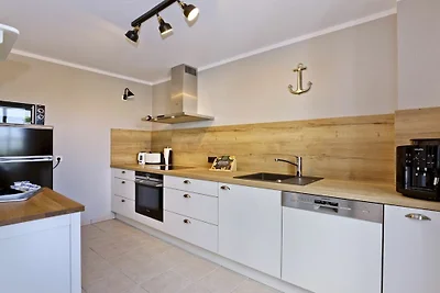 Zalmvissers in hun huisje aan de Rijn