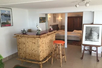 Wohnung und Blick auf den Privatstrand.