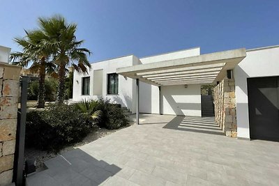 Moderne villa in Cumbre del Sol met zeezicht