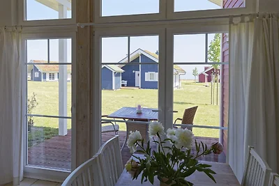 Bungalow moderno con stufa a legna e vista...