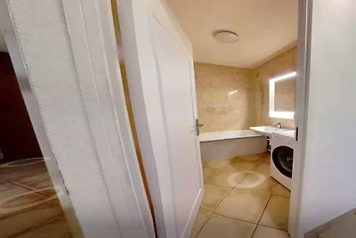 Camera accogliente in un accogliente appartam...