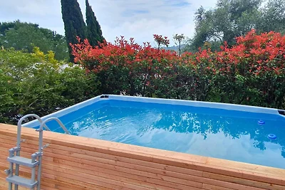 Appartement aan het zwembad in een Italiaanse...