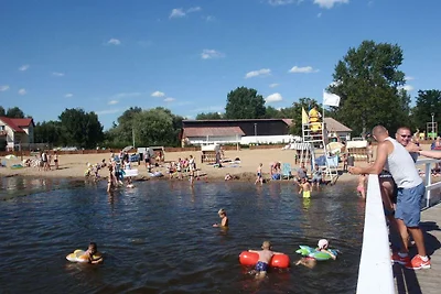 Ferienhaus mit umzהuntem Garten in Stepnica