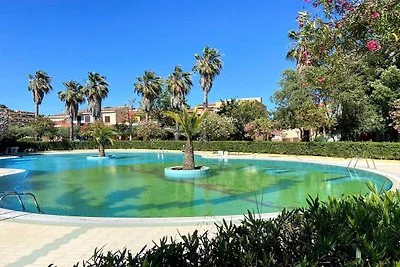 Apartment mit Pool und privatem Parkplatz