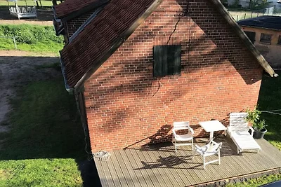 Vakantieappartement in het gele huis